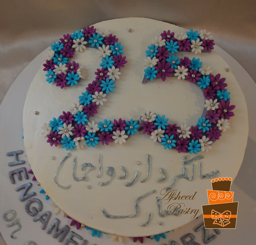 Anniversary cake for maapaa . . . #anniversarycake #momdadanniversarycake❤  #couplecake #rosevanillacake #homemade #baking #calendar #calendarcake  #december | By BakeAngleFacebook
